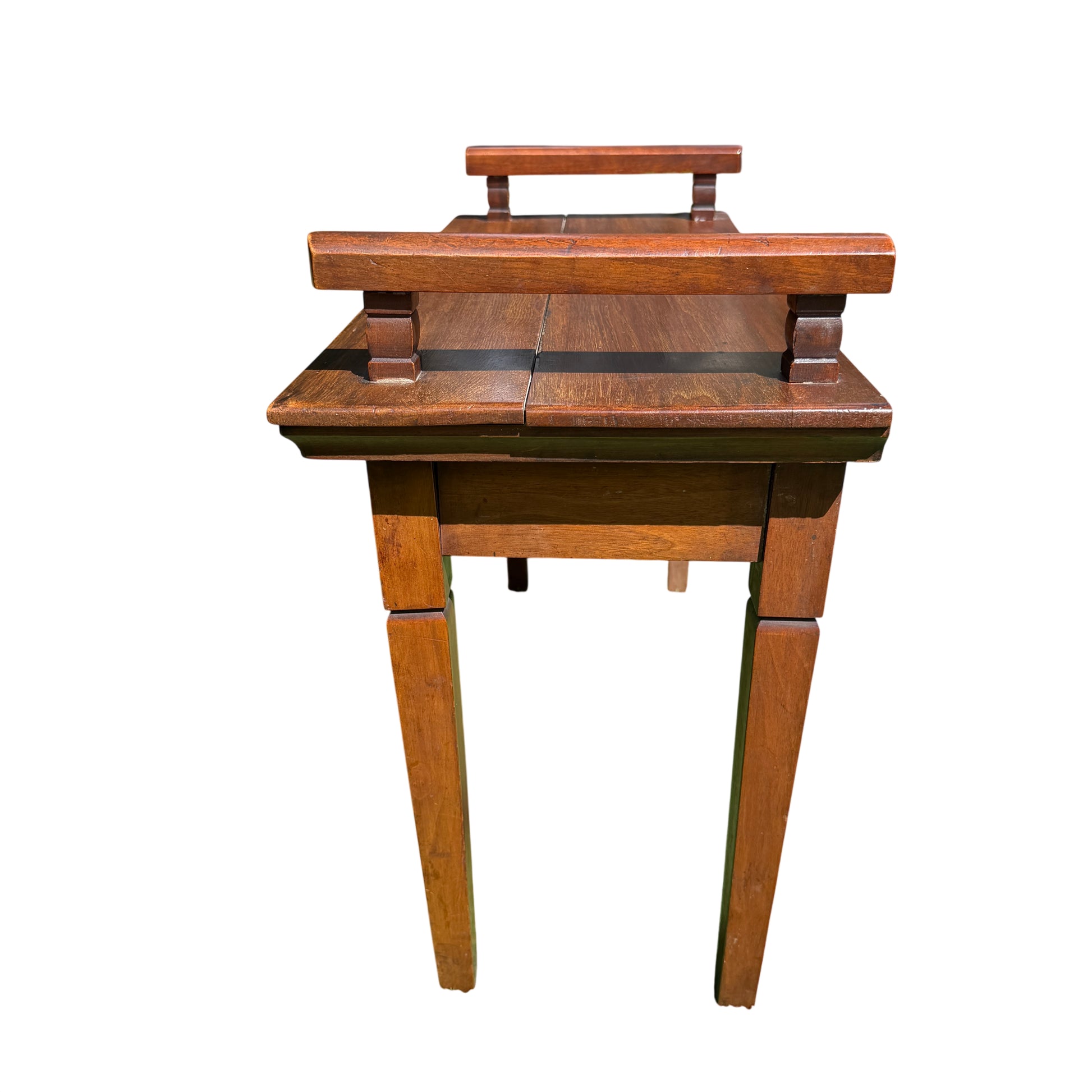 Close-up of turned support and handle fixing on vintage mahogany serving table