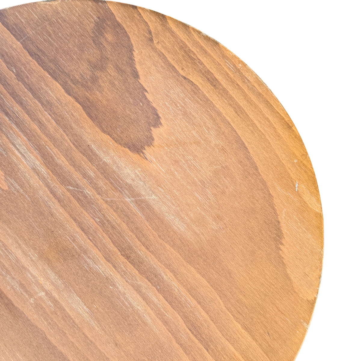 Wooden stool placed outside showing overall profile and height