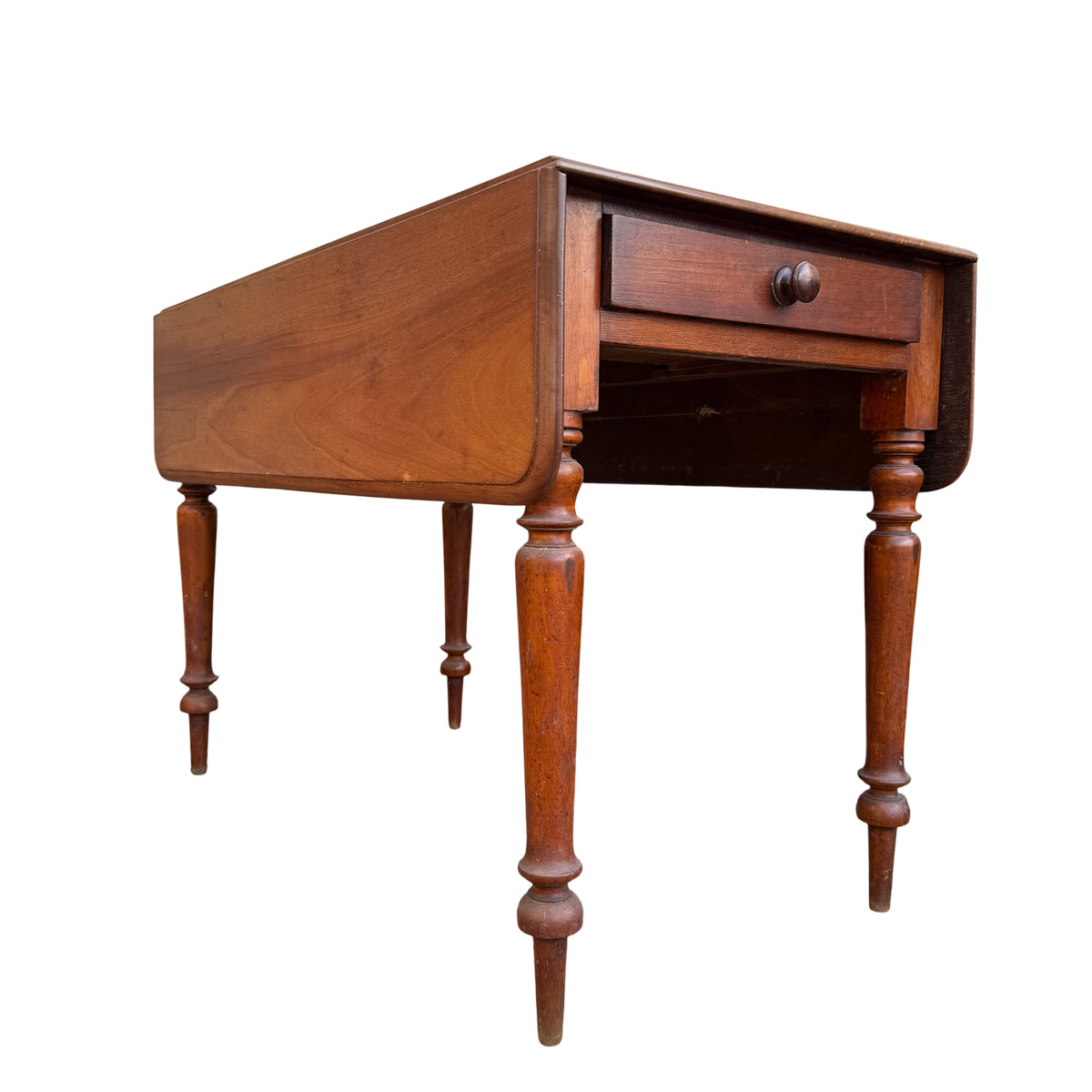 Victorian drop-leaf dining table with single drawer and turned legs in warm wood finish