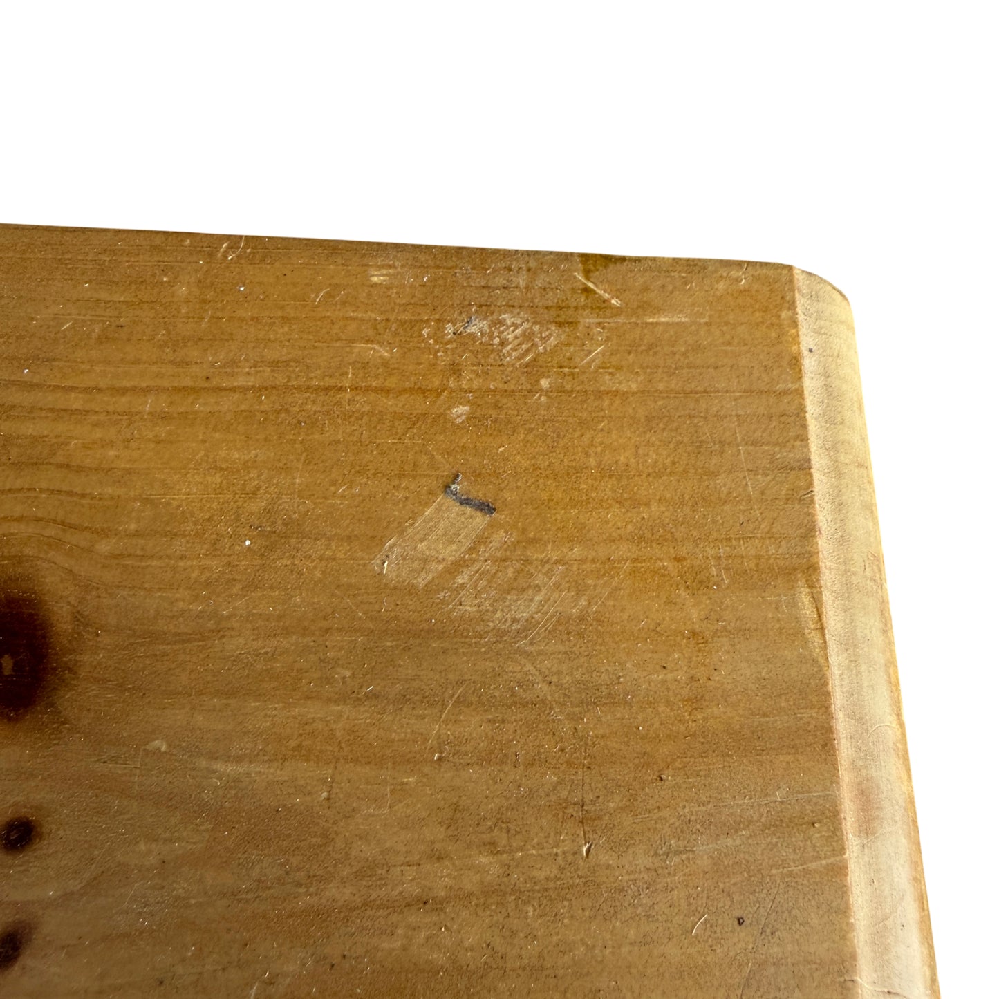 Detail of drawer moulding and natural pine finish on bedside cabinet