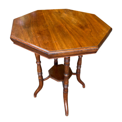 Victorian walnut octagonal side table with turned column legs and octagonal lower shelf