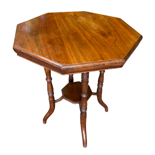 Victorian walnut octagonal side table with turned column legs and octagonal lower shelf
