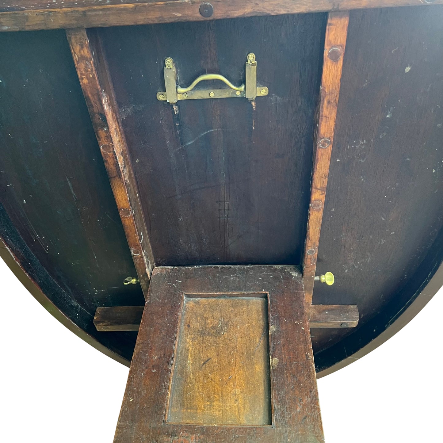 Close-up of mahogany tabletop showing grain and patina
