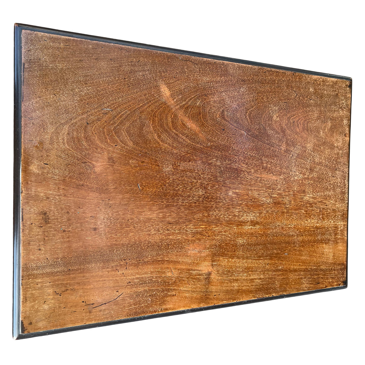 Close-up of tabletop grain and light surface marks on vintage nesting table
