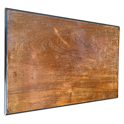 Close-up of tabletop grain and light surface marks on vintage nesting table