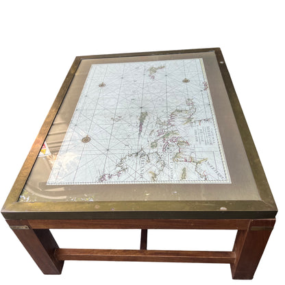 Detail of oak leg and brass corner plate on vintage coffee table