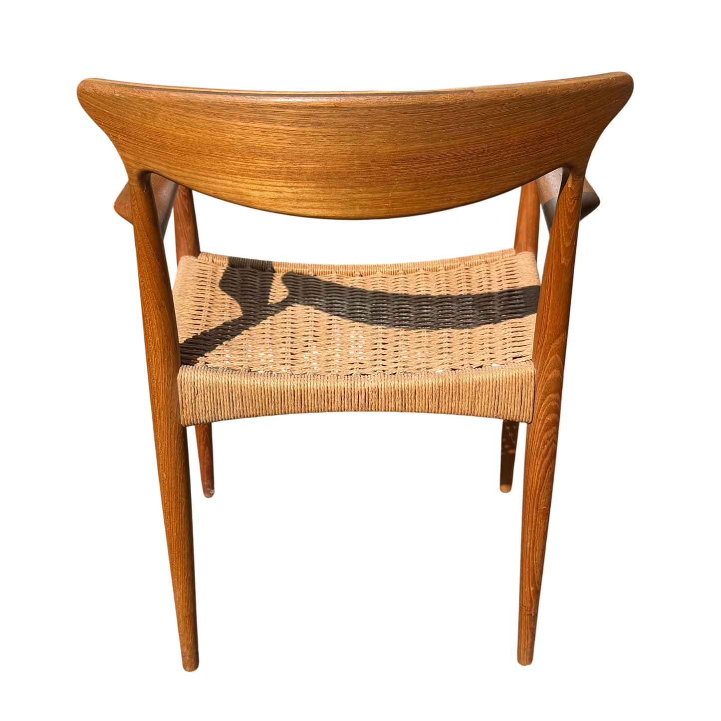 Close detail showing paper-cord seat loops and underside joins