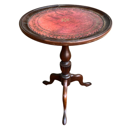 Victorian mahogany pedestal side table with round red tooled leather top and tripod base