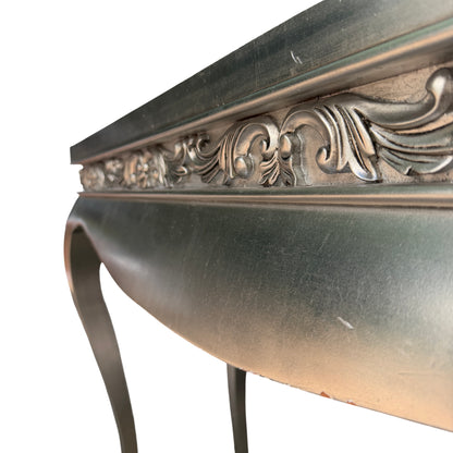 Top surface of silver painted console table showing textured metallic finish