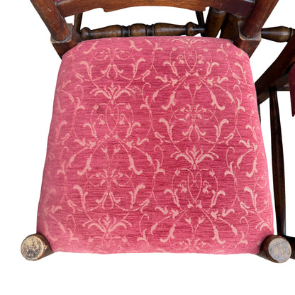 Detail of turned front leg and stretcher on a vintage oak dining chair