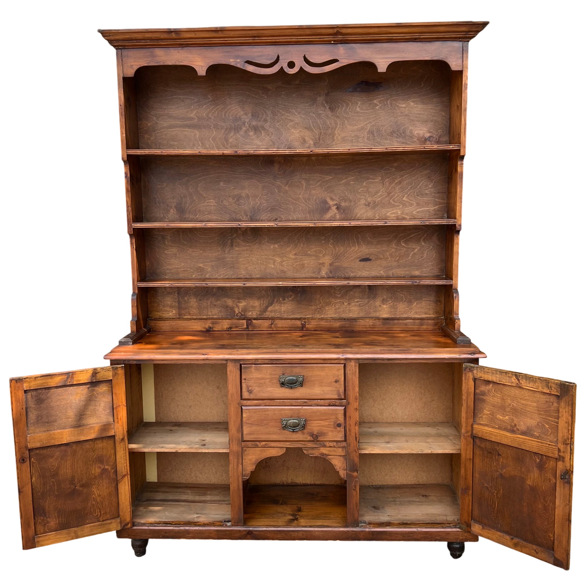 Rustic pine dresser with three display shelves and storage base