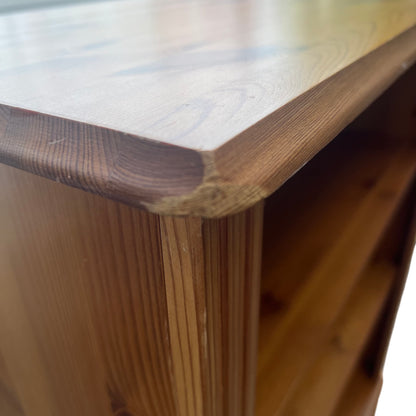 Close-up of pine bookcase top surface and natural wood grain