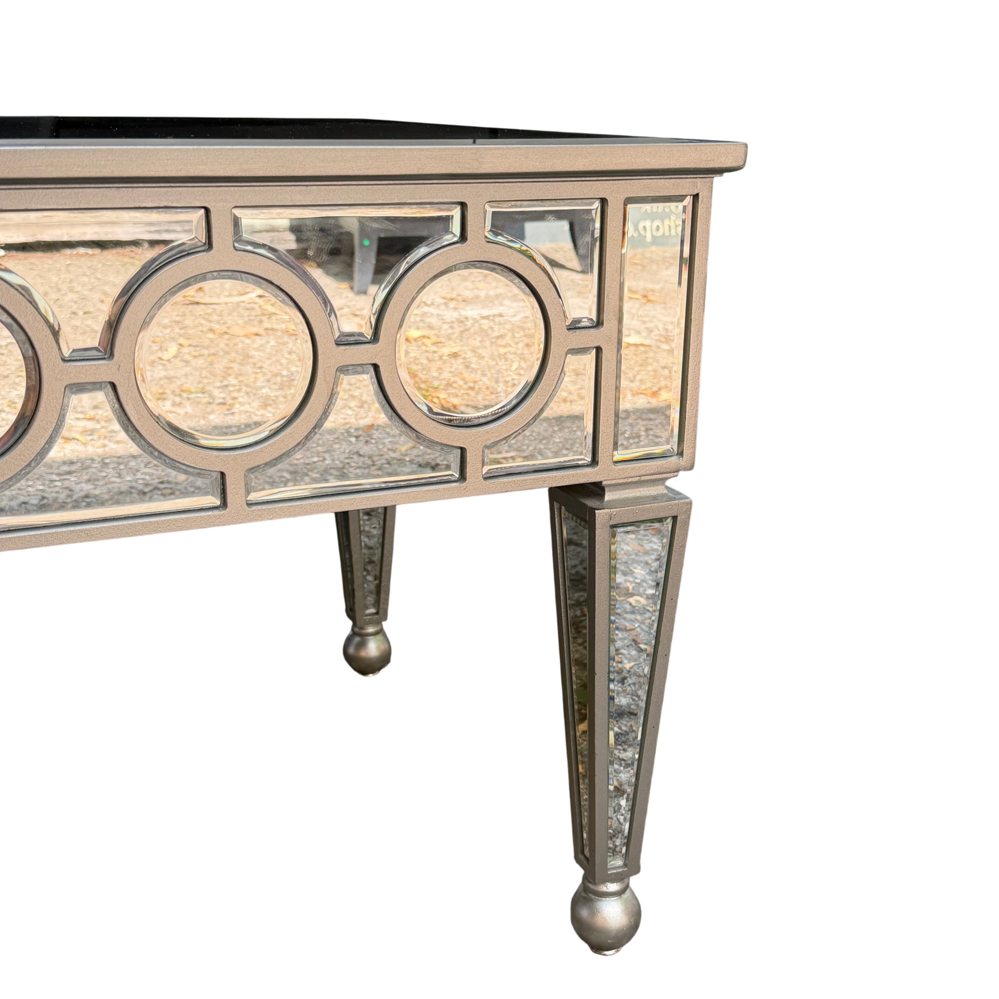 Contemporary mirrored bedside table with glass top and mirrored side panels