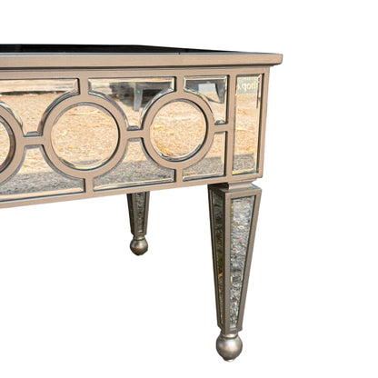Contemporary mirrored bedside table with glass top and mirrored side panels