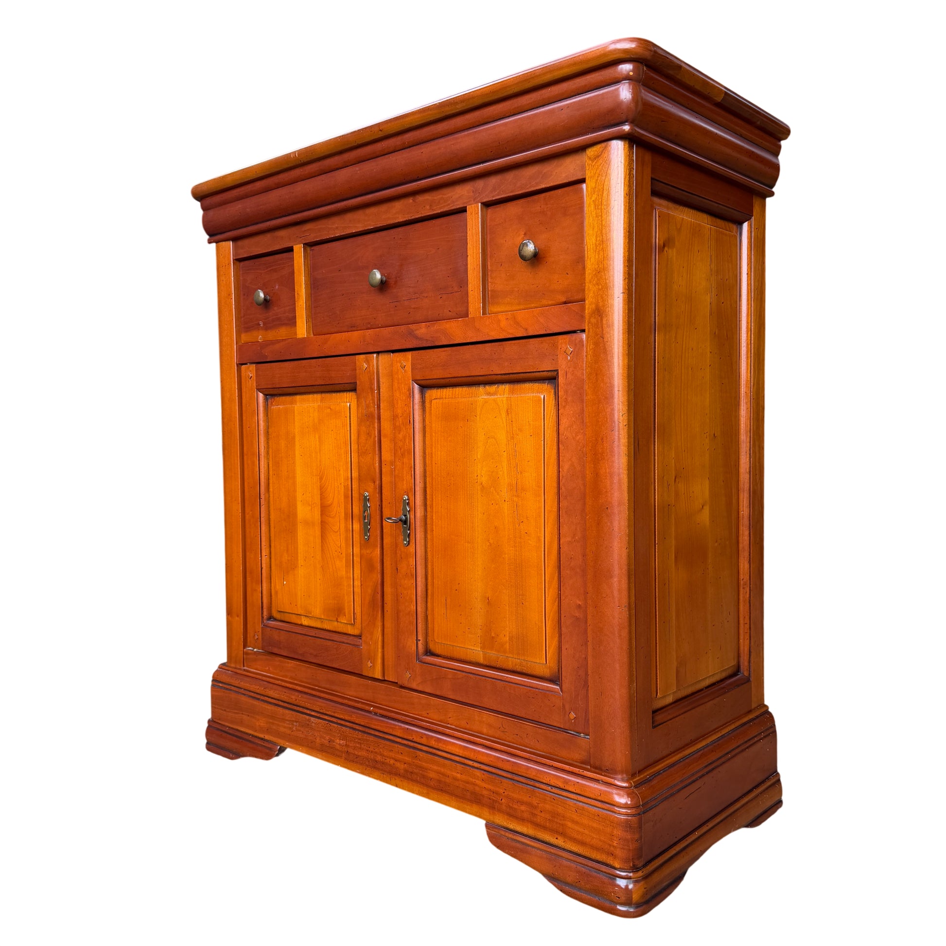 French reproduction two-door wooden cupboard with three top drawers and warm wood finish