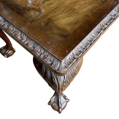 Detail of carved apron and edge trim on burr walnut coffee table
