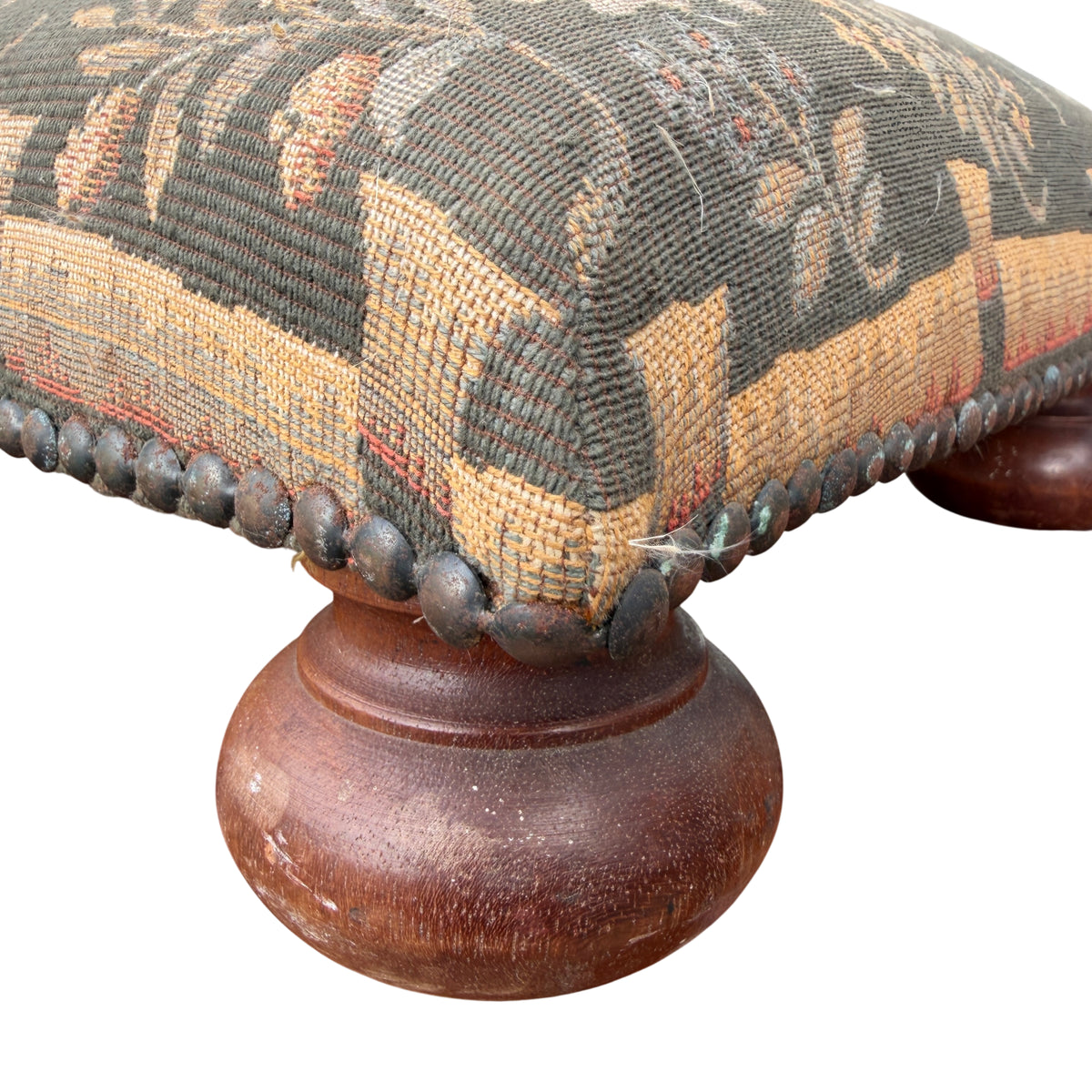 Top view of square tapestry footstool with woodland animals and floral design