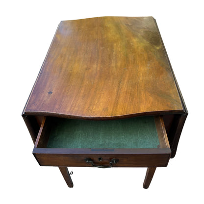Front view of vintage Pembroke table with metal swing handle and key escutcheon