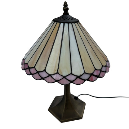 Tiffany-style stained glass table lamp with cream panels and pale pink scalloped border on brass-effect base