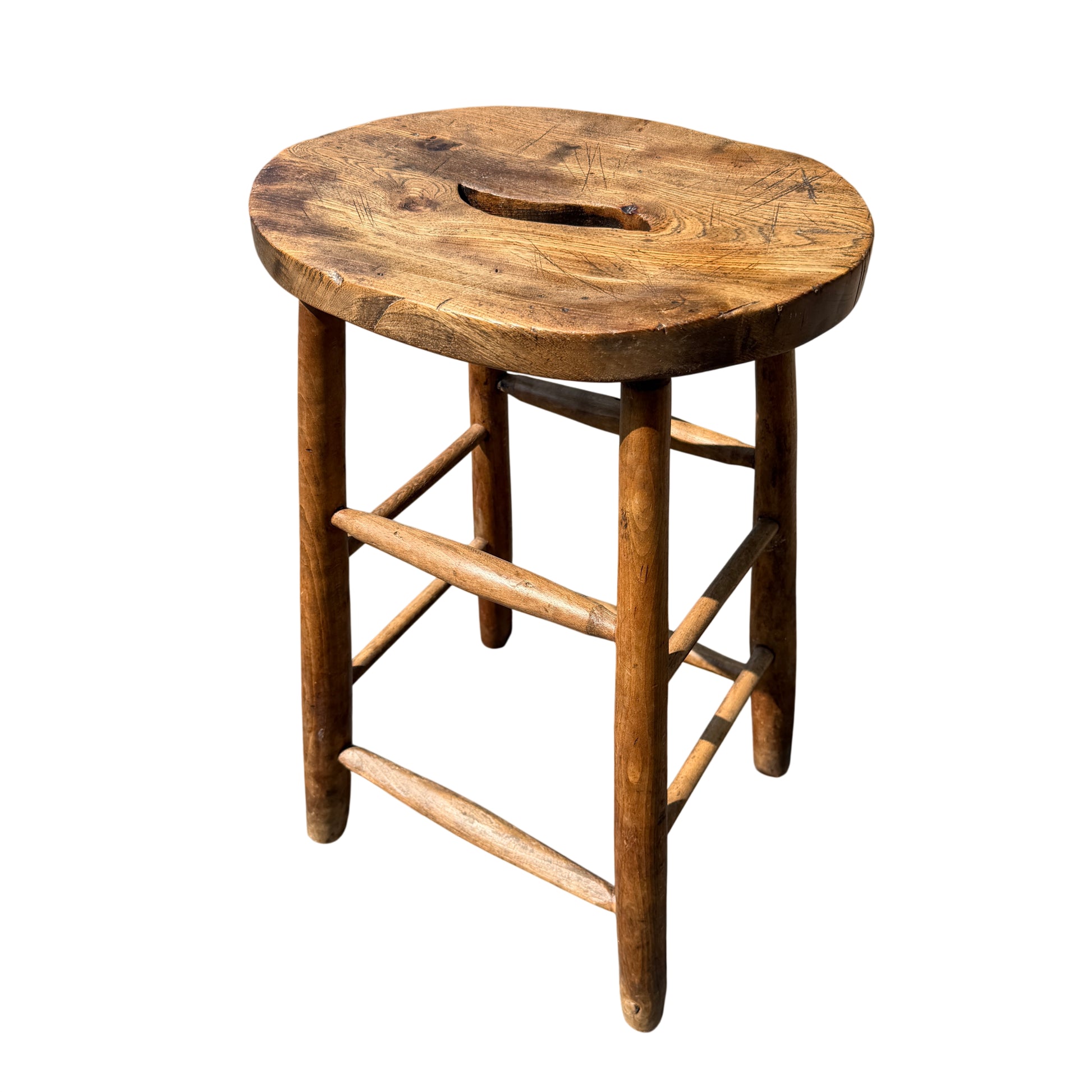 Vintage solid wood stool with round seat and carry cut-out in oak finish