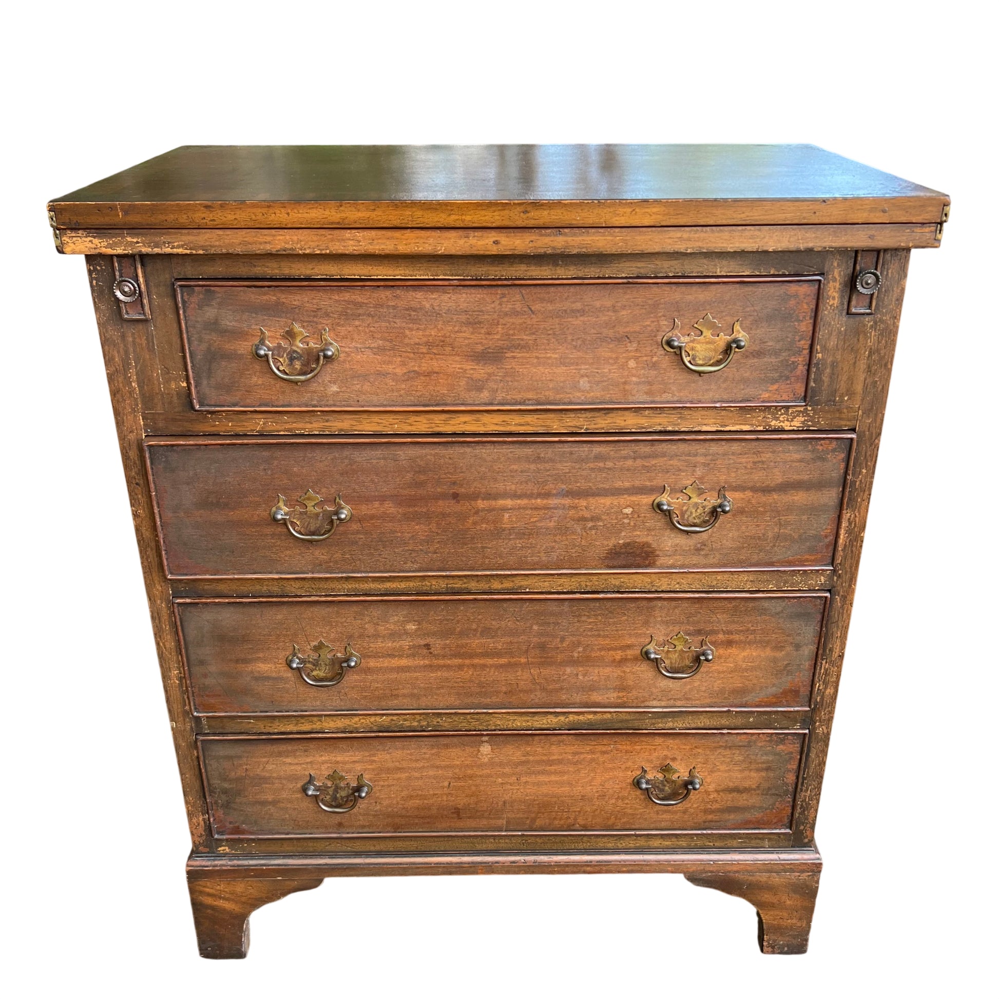Vintage oak chest of drawers with brass drop handles and moulded drawer fronts