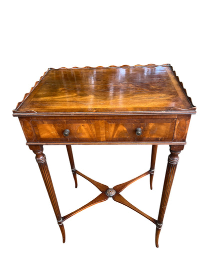 Small Victorian hall table with figured veneer top and single centre drawer