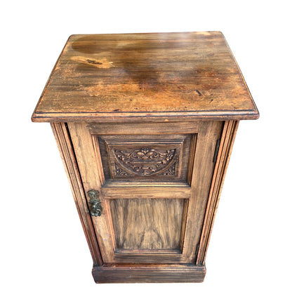 Top view of vintage oak bedside cabinet showing aged patina and wood grain
