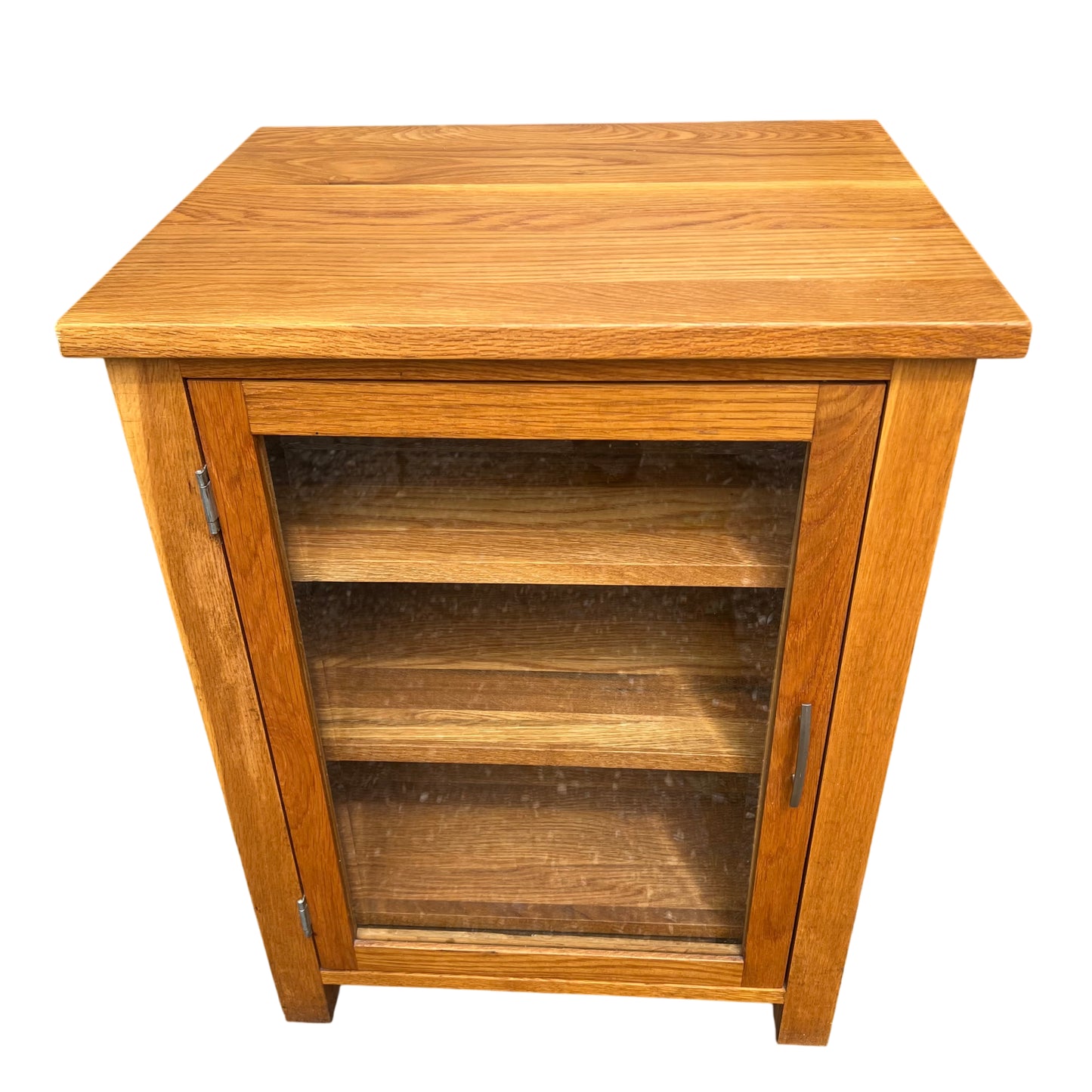 Front view oak display cabinet with glass door and slim metal pull handle