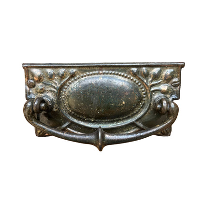 Detail of moulded cornice and decorative cut-out on pine dresser top