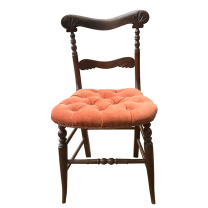Carved top rail and turned uprights on a Victorian dining chair with upholstered seat