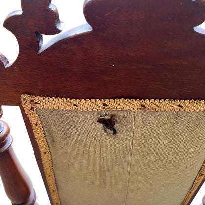 Upholstery edge and braided gimp trim showing wear