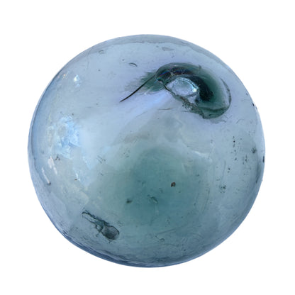 Pale aqua hand-blown glass float with small burst pontil scar and abrasions