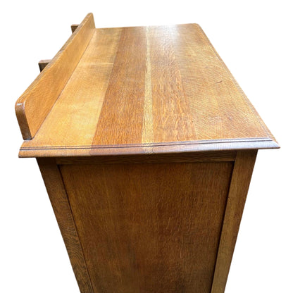 Side view of solid oak chest with plain boarded side panels