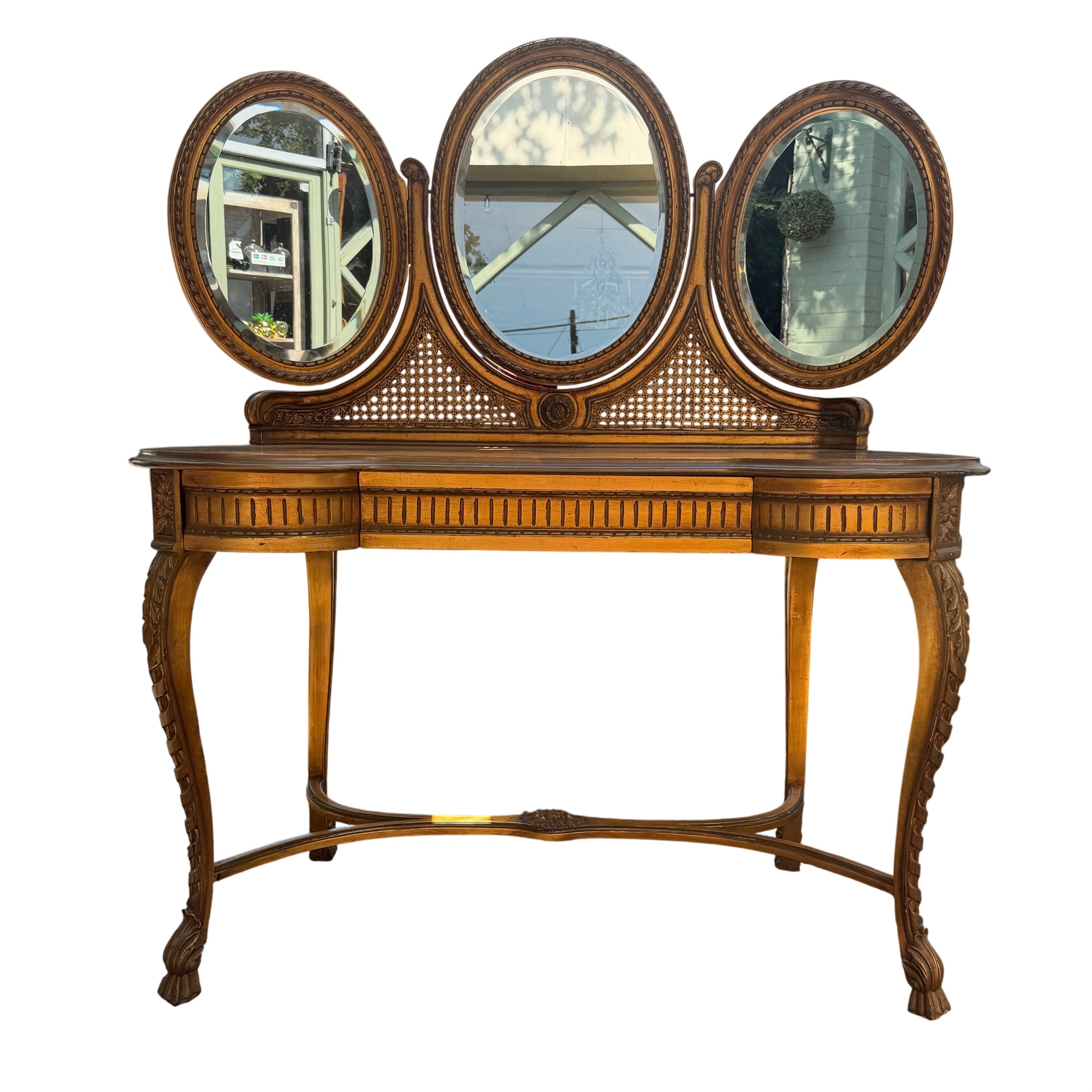 Three oval mirrored dressing table with gold finish and carved legs