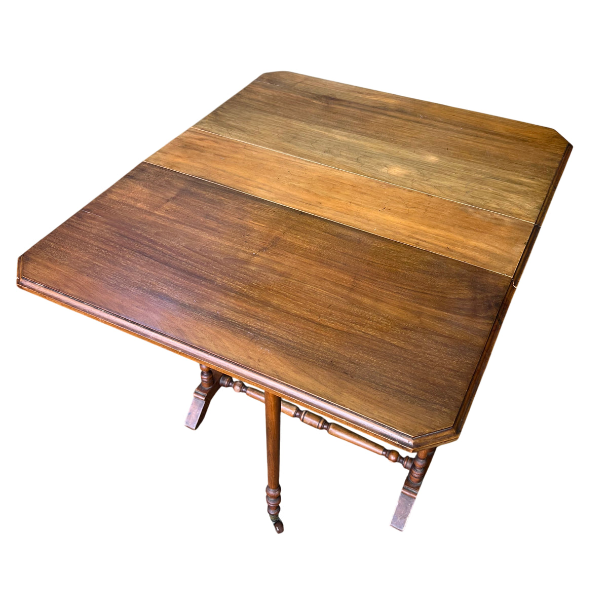 Close-up of turned spindle legs and stretcher on Victorian occasional table