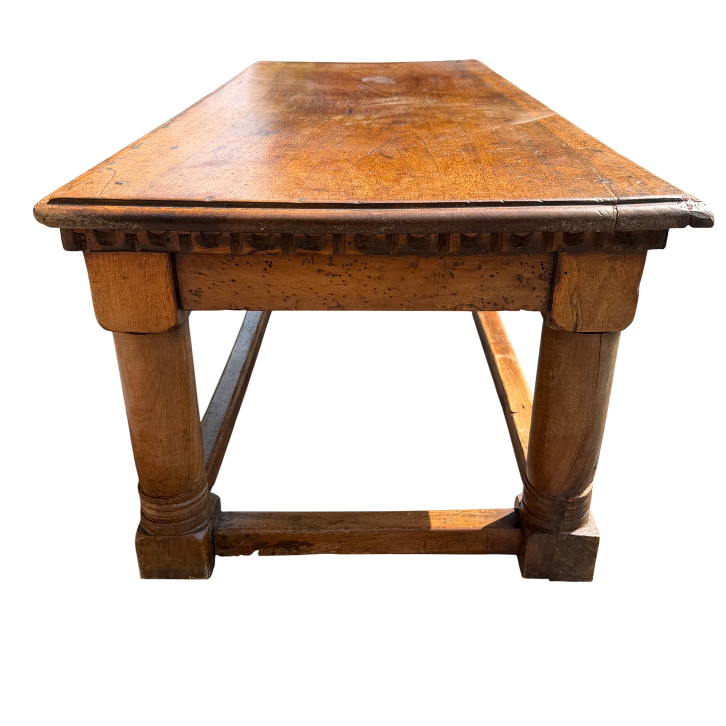 Long view along the length of a rectangular solid oak coffee table