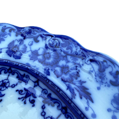 Close-up of underside showing glaze crazing and minor glaze flaking on base