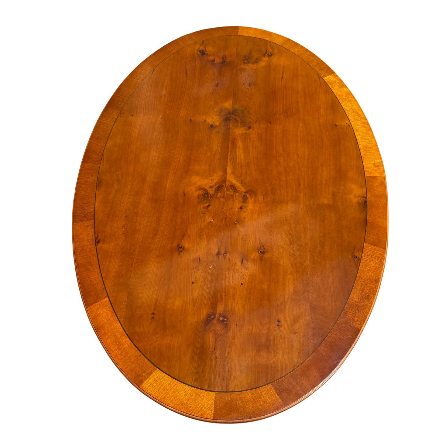 Pedestal dining table with turned central column and splayed legs on castors