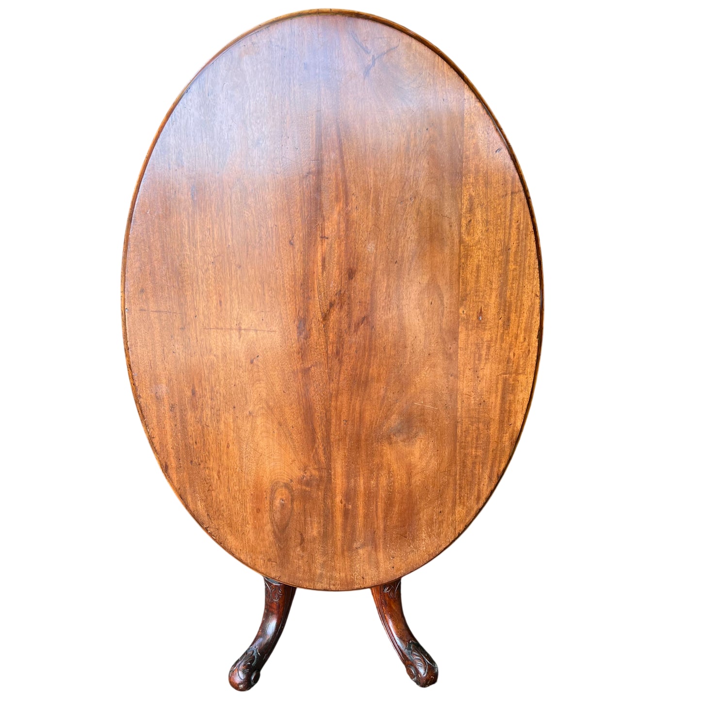 Victorian pedestal dining table with carved tripod base in mahogany