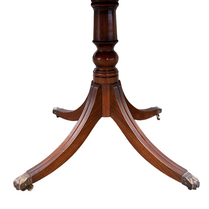 Top-down view of the round dining table showing overall finish and grain