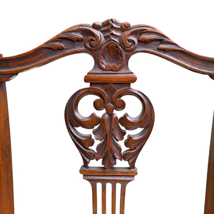 Detail of turned leg and scrolled knee on an Edwardian dining chair