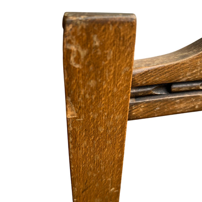 Seat and back detail of a vintage Old Charm bar stool with fabric cushion