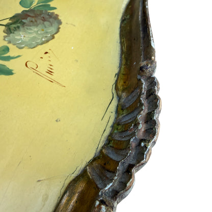 Gilt moulded frame and scalloped edge of vintage painted tray