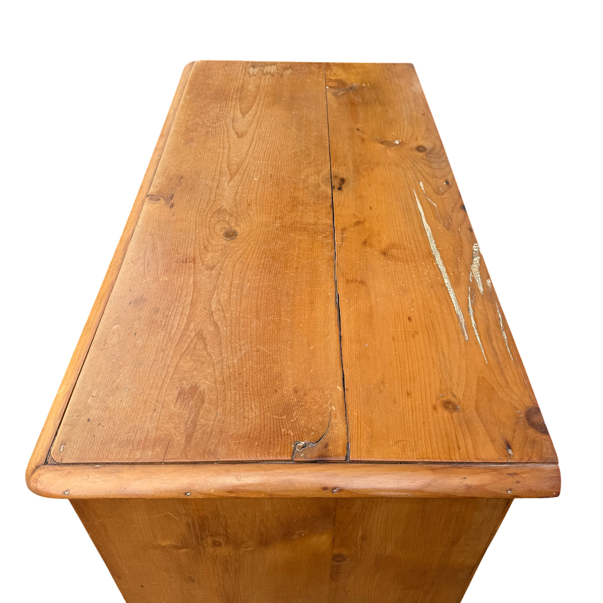 Two short top drawers above longer drawers on solid pine chest
