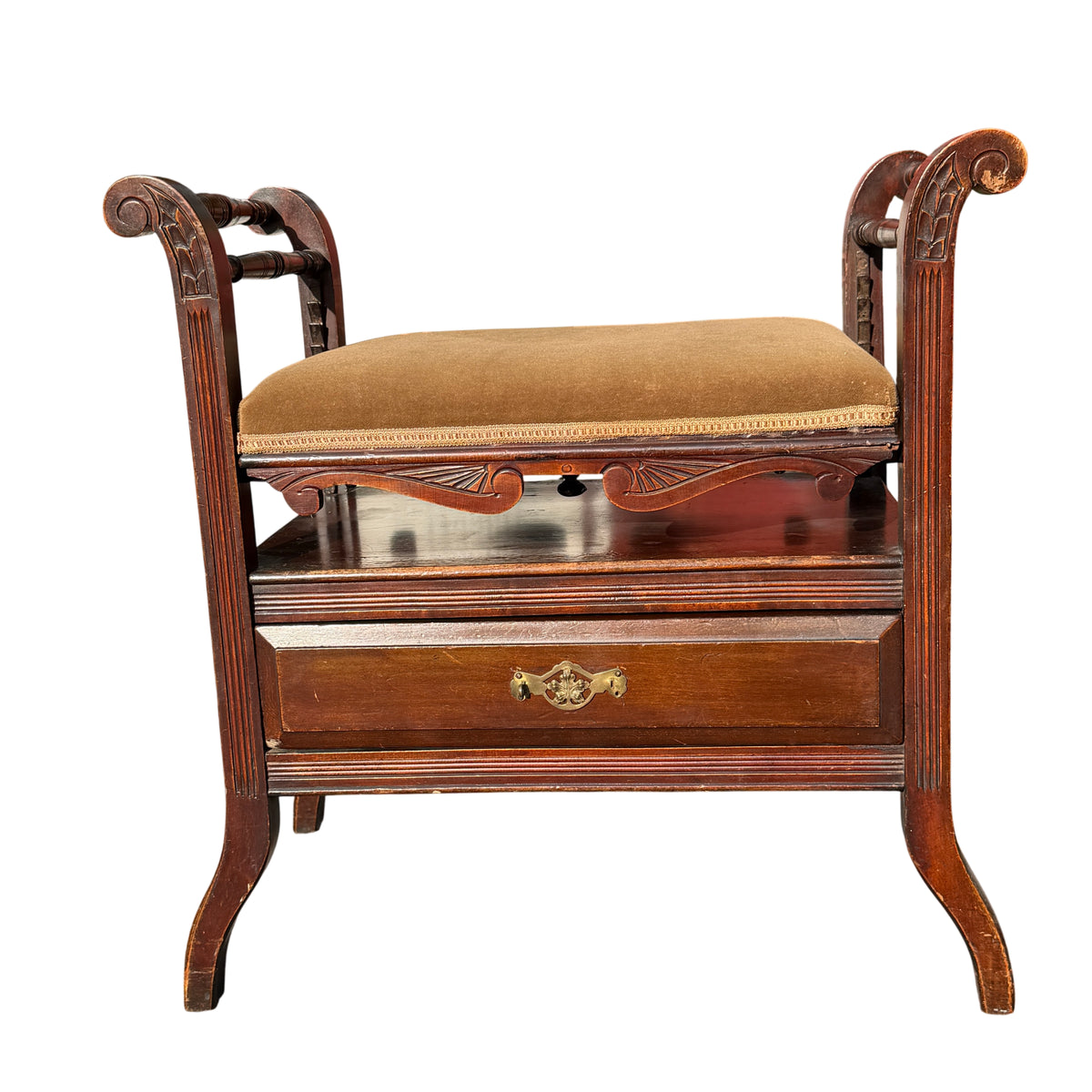 Front view Victorian piano stool with upholstered seat and carved apron detail