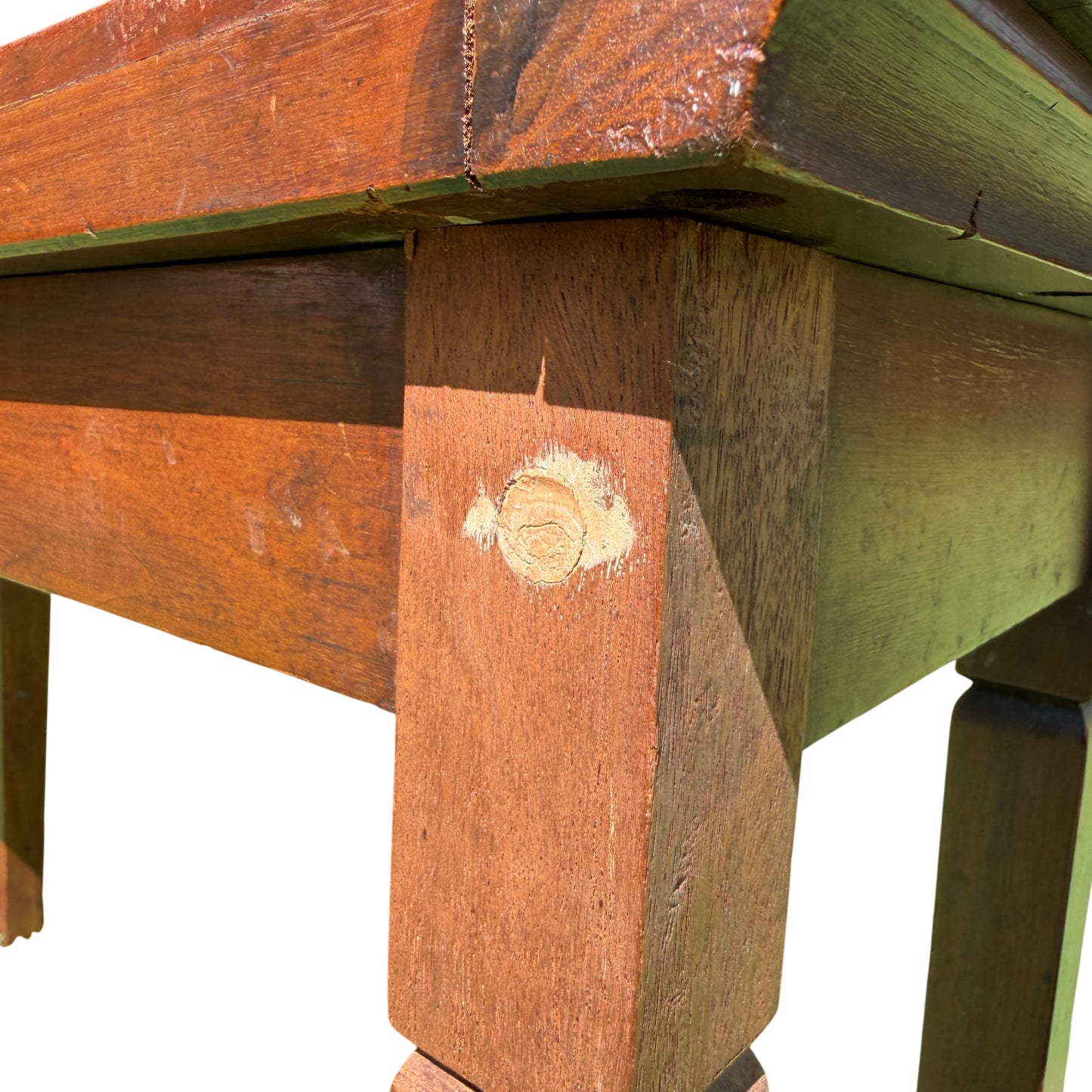 Close-up of raised gallery handle on mahogany serving table mounted on turned supports