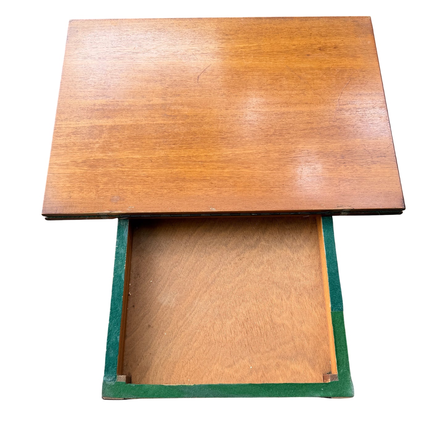 Lower shelf and straight legs of a vintage wooden trolley table on casters