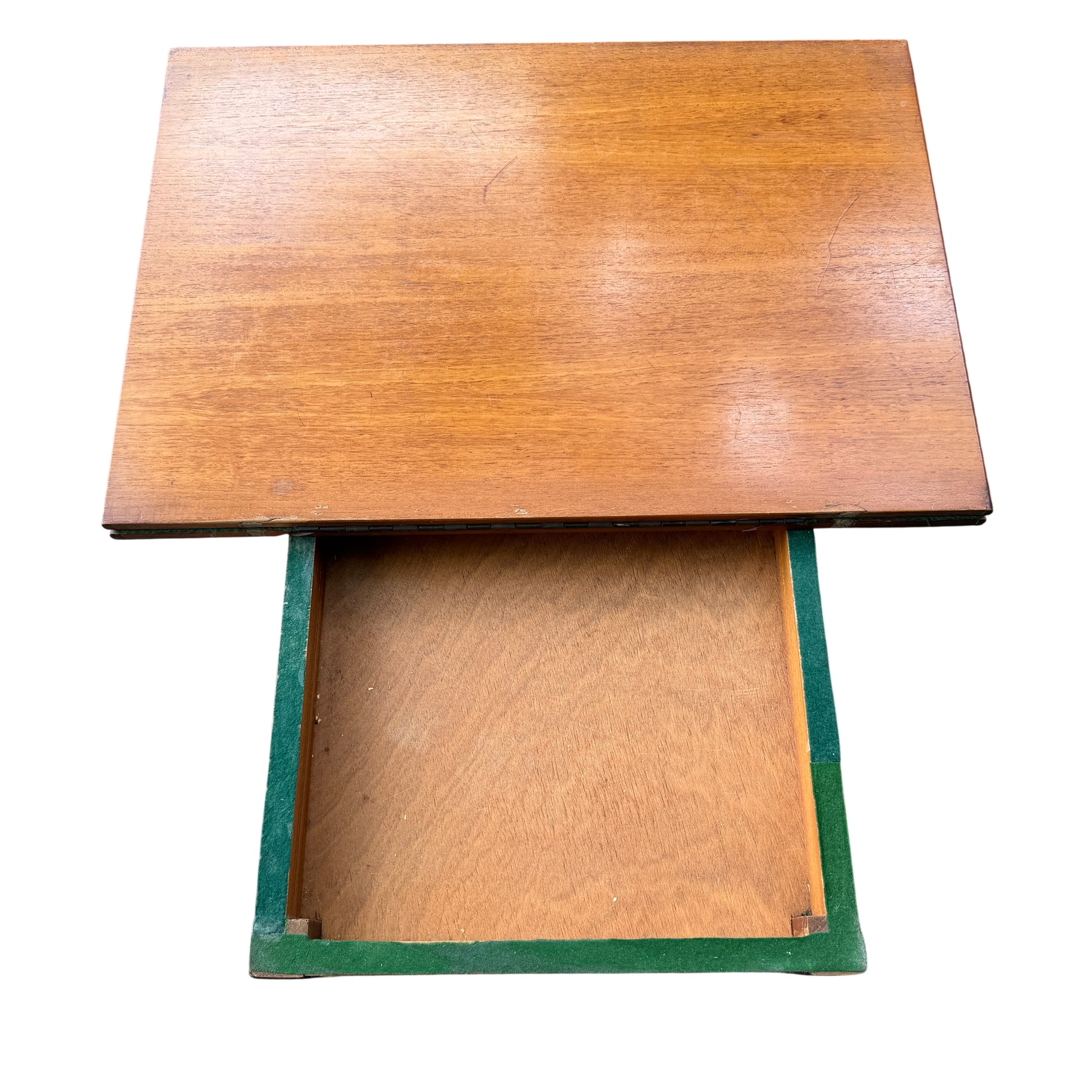 Lower shelf and straight legs of a vintage wooden trolley table on casters