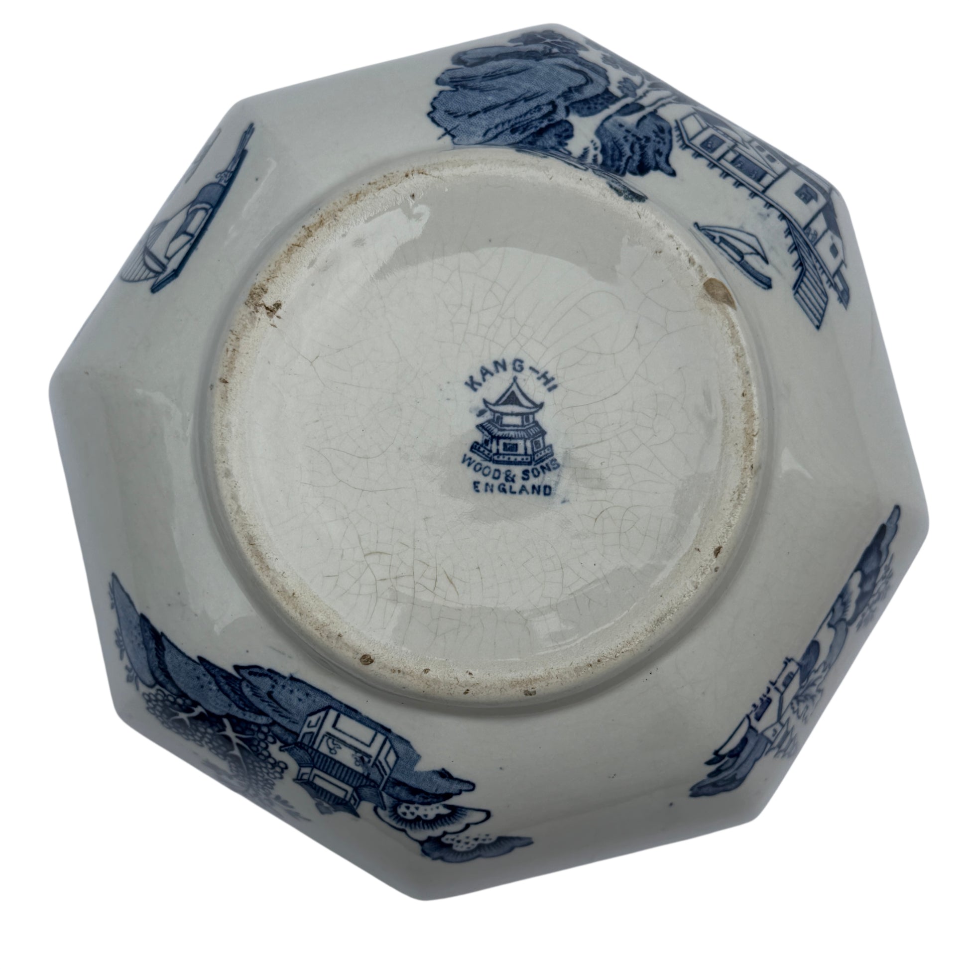 Angled view of octagonal porcelain serving bowl with blue and white transfer design