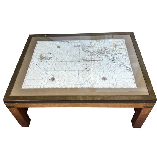 Vintage oak coffee table with brass rimmed glass top and inset nautical map